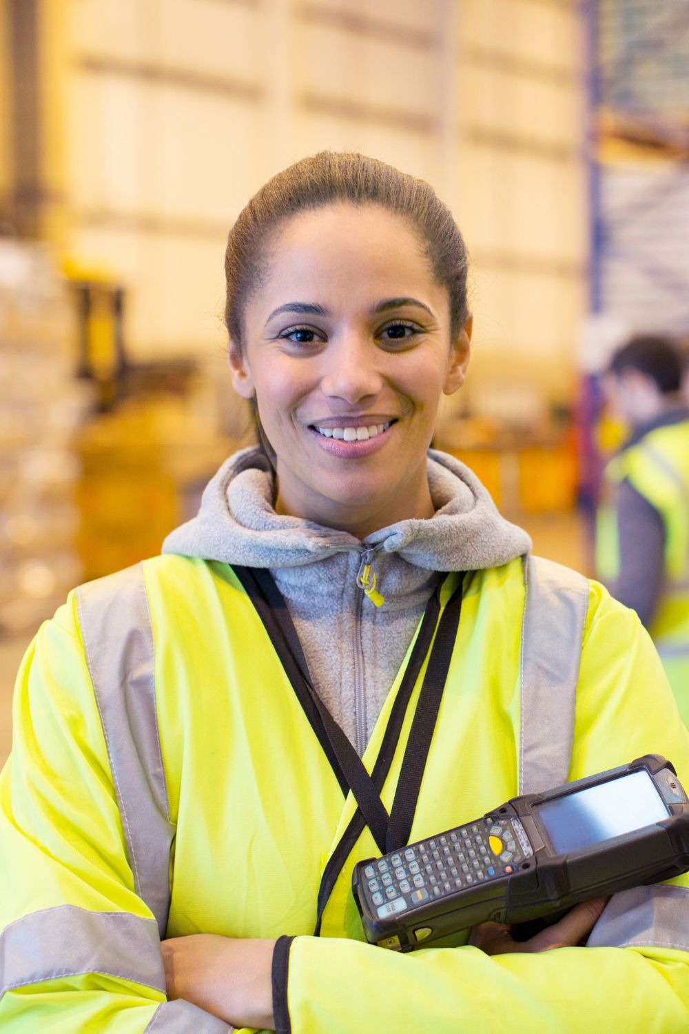 Woman Warehouse Worker Holding Scanner